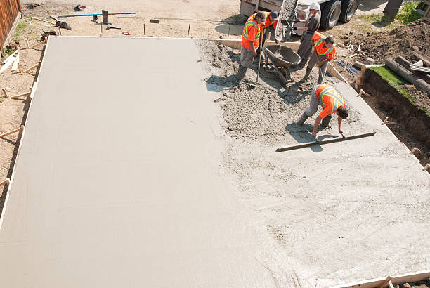 Best Concrete Sidewalk Installation  in Canadian Lakes, MI